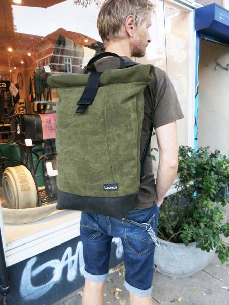 Upcycling Backpack, made of olive army tent Canvas, tractorhose and Seatbelts, the interior is made of Tarpaulin in 3 sizes